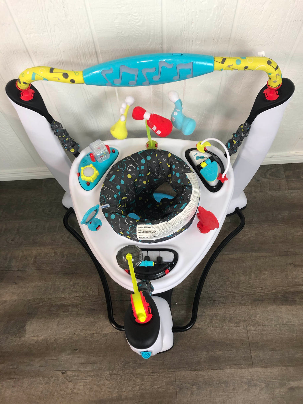 evenflo exersaucer music