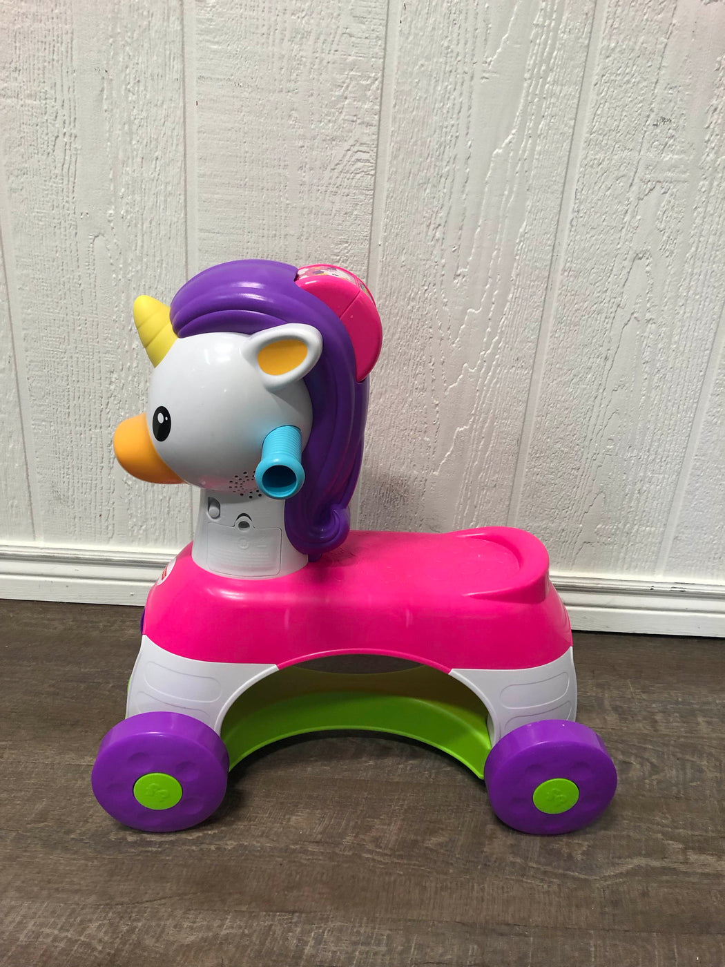 fisher price push and flutter unicorn