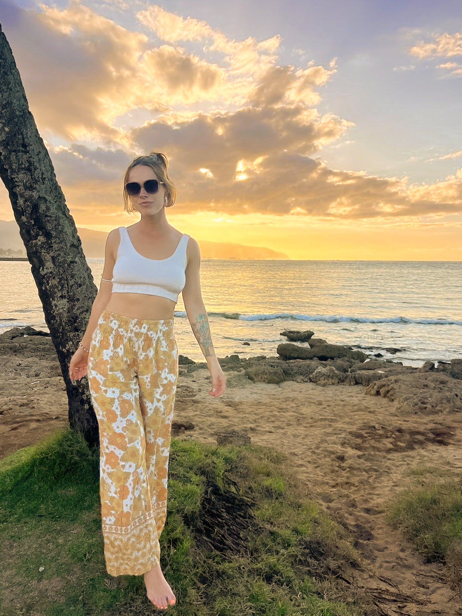 PIYOGA in Hawaii at sunset with the 70s yellow flower flares