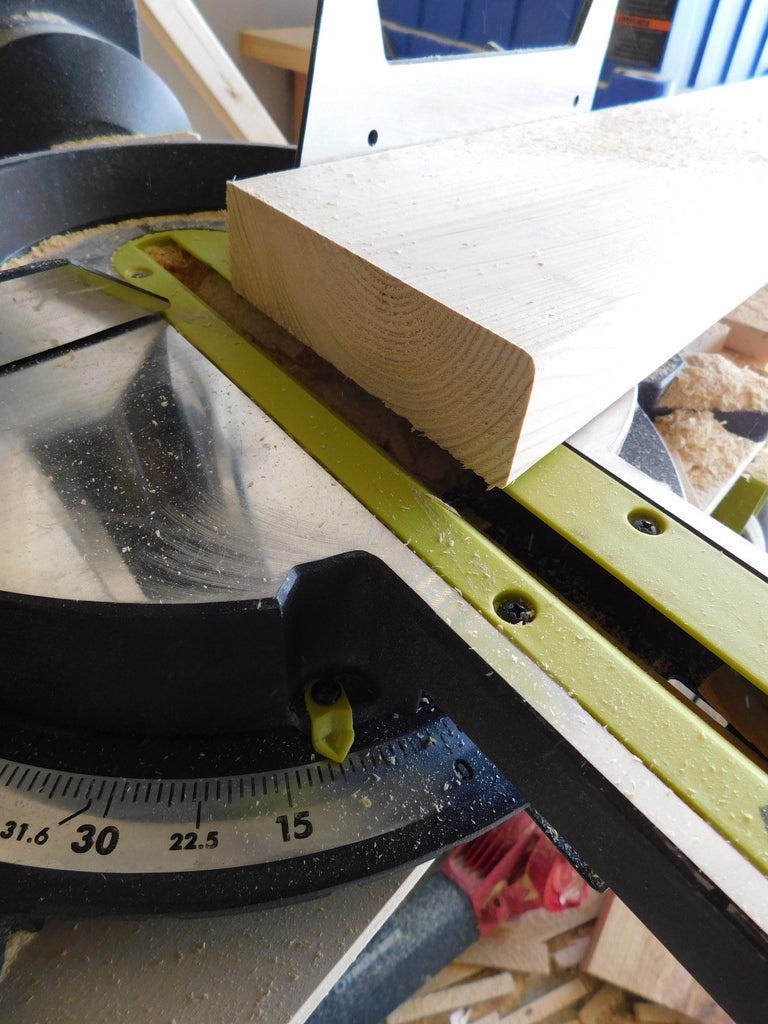 Cutting lumber on a Ryobi Miter Saw