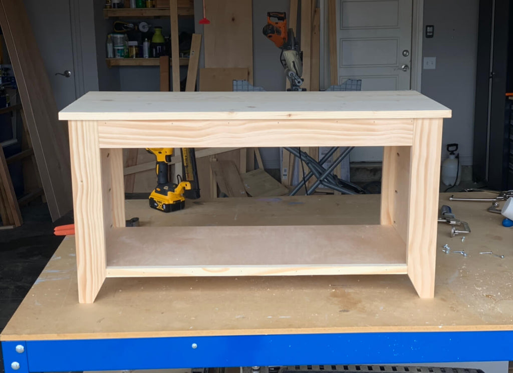 DIY Entryway Hall Tree Bench sitting on a Kreg Workbench in a wood shop