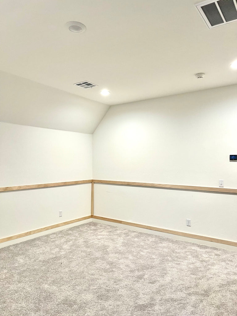 blank room with wall paneling