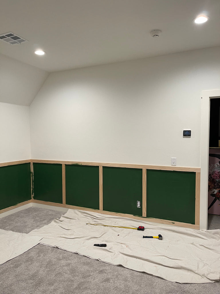 Room with wainscoting and trim painted Behr paint deep veridian