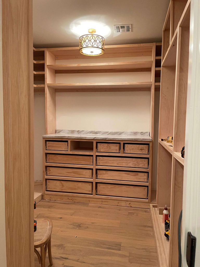 Installing drawers for the master closet