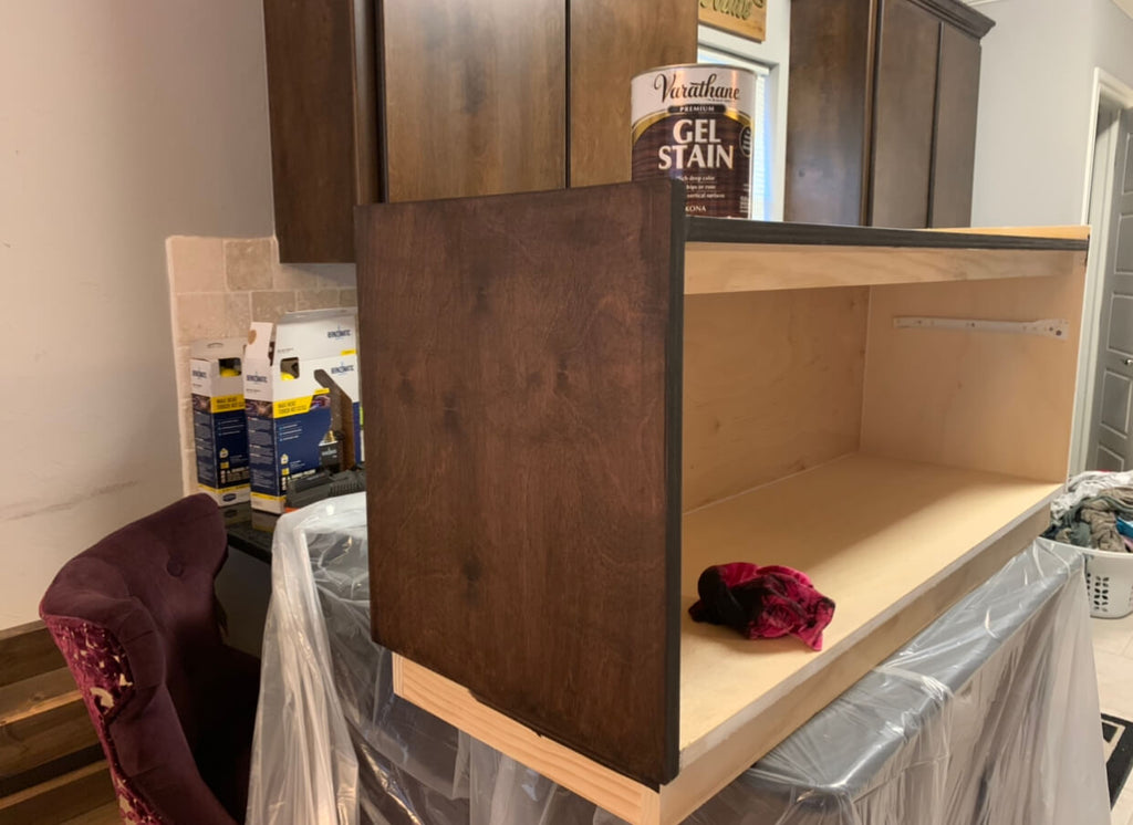 Using rustoleum Kona gel stain to stain a storage bench in a kitchen