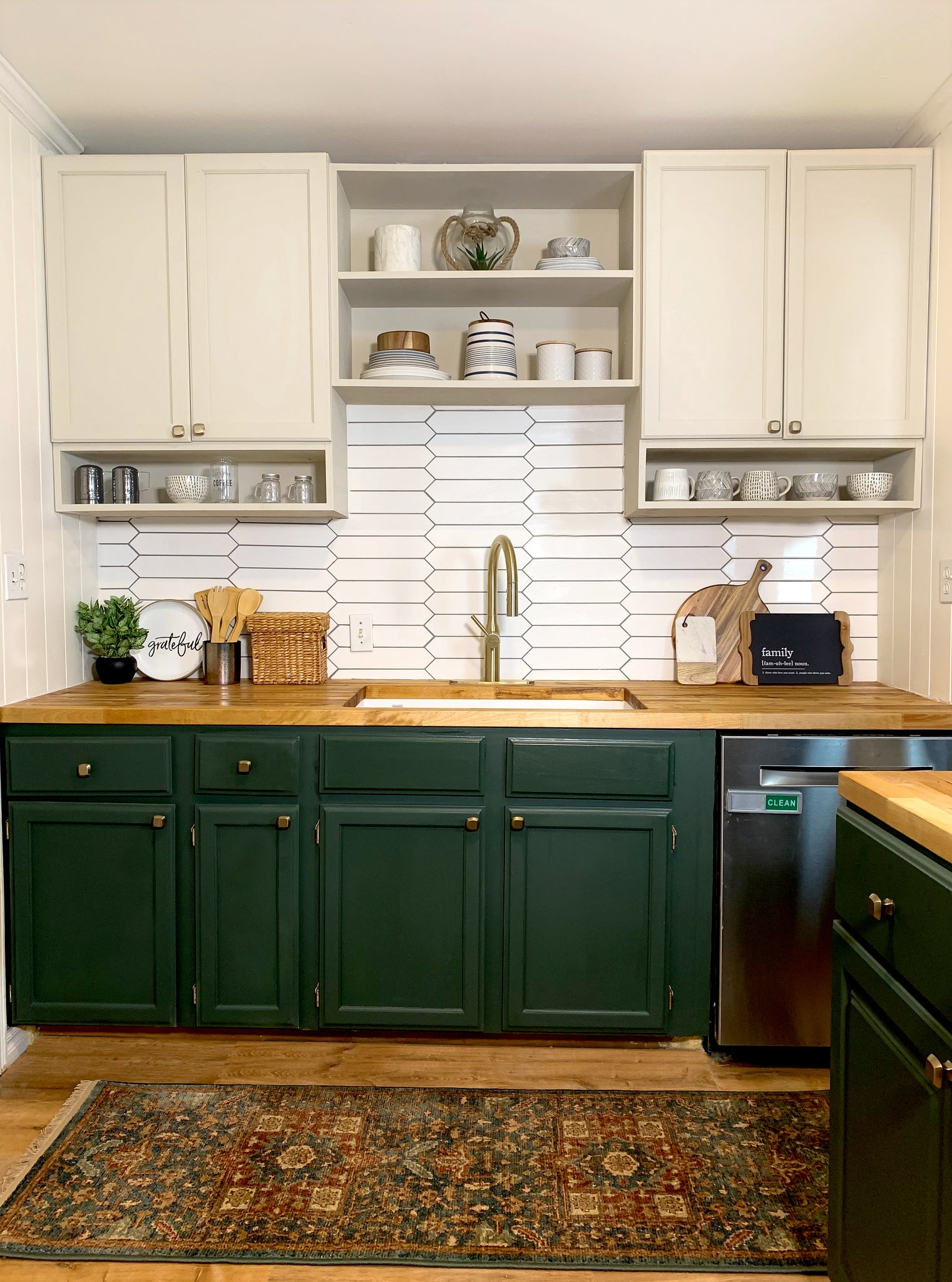 Kitchen Renovation with two tone cabinets and subway tile
