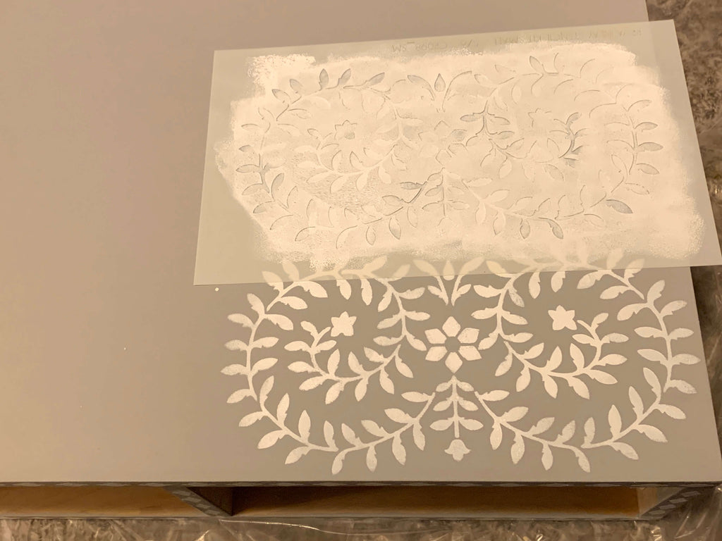 Priya Bone Inlay Cutting Edge Stencil being painted on a DIY Vanity Desk