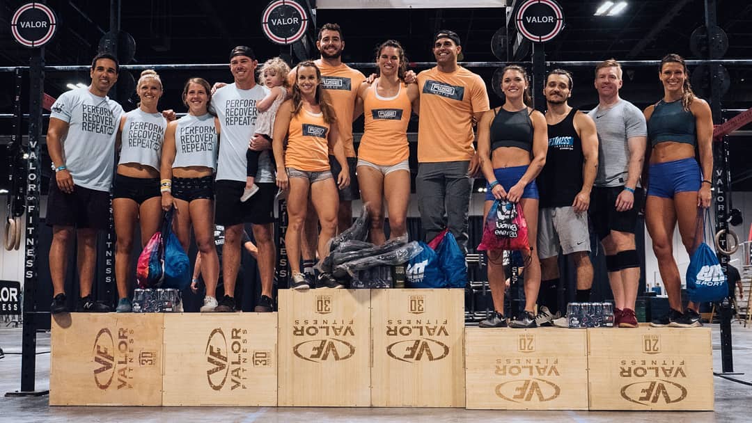 Podium for CrossFit RX division featuring Aaron Hanna, Kimberlee Midori, Dillion Bailey, Hannah Richards