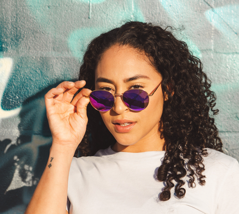 Brunette wearing fashion wire circle sunglasses