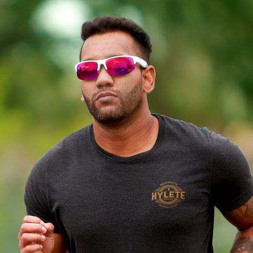  Man wearing AMP sunglasses out running
