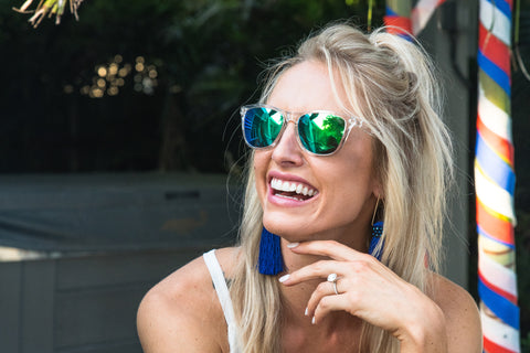 girl in sunglasses laughing