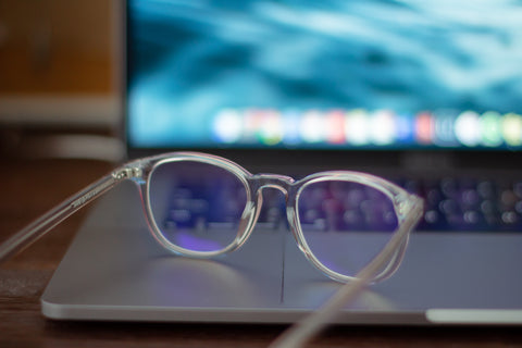 Blue Light glasses on keyboard of laptop