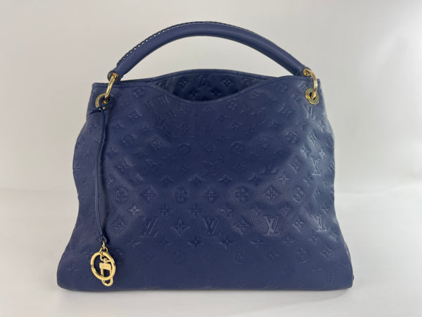 Lot - A Louis Vuitton Empreinte Artsy MM hobo bag