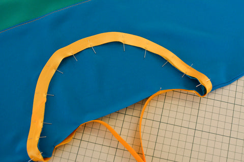 Pinned bias binding around a neckline