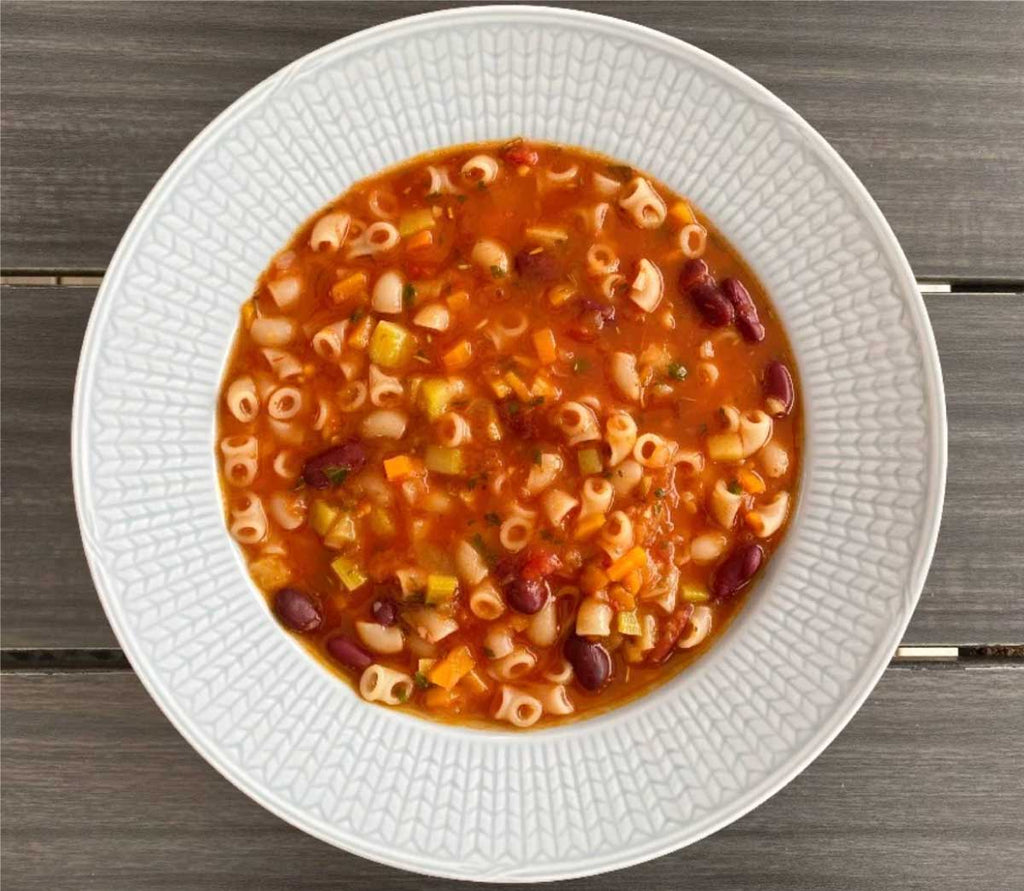 Child-friendly minestrone soup in a deep plate