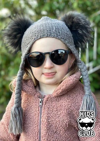 Cute kid with our eyewood sunglasses.