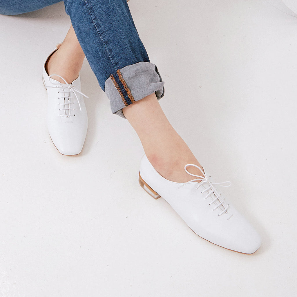 white lace up shoe