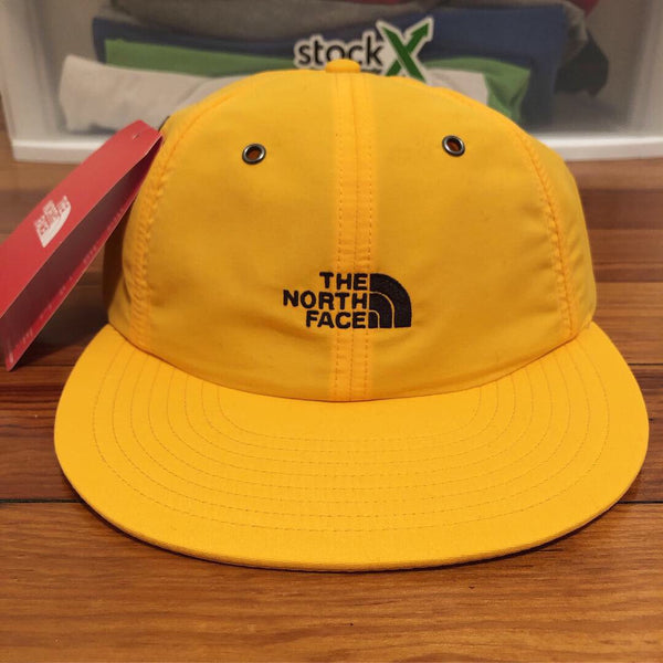 yellow north face hat