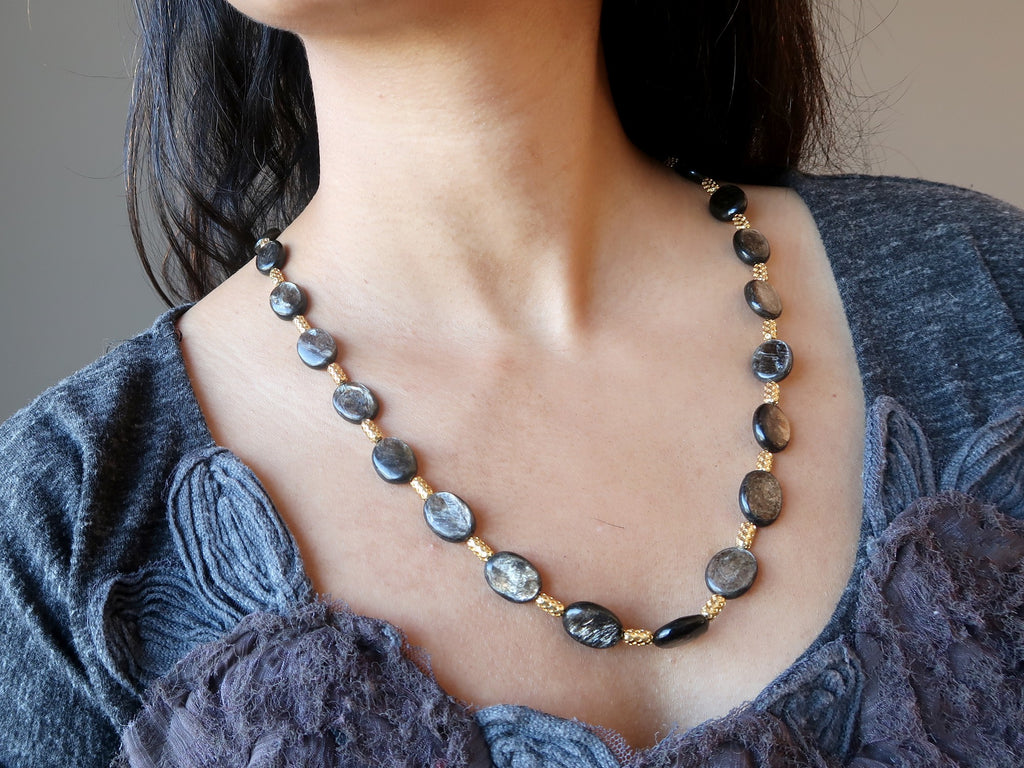woman modeling mica beaded necklace