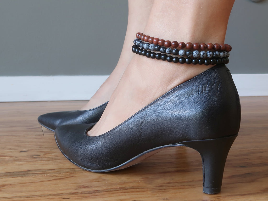high heeled feet modeling obsidian anklets