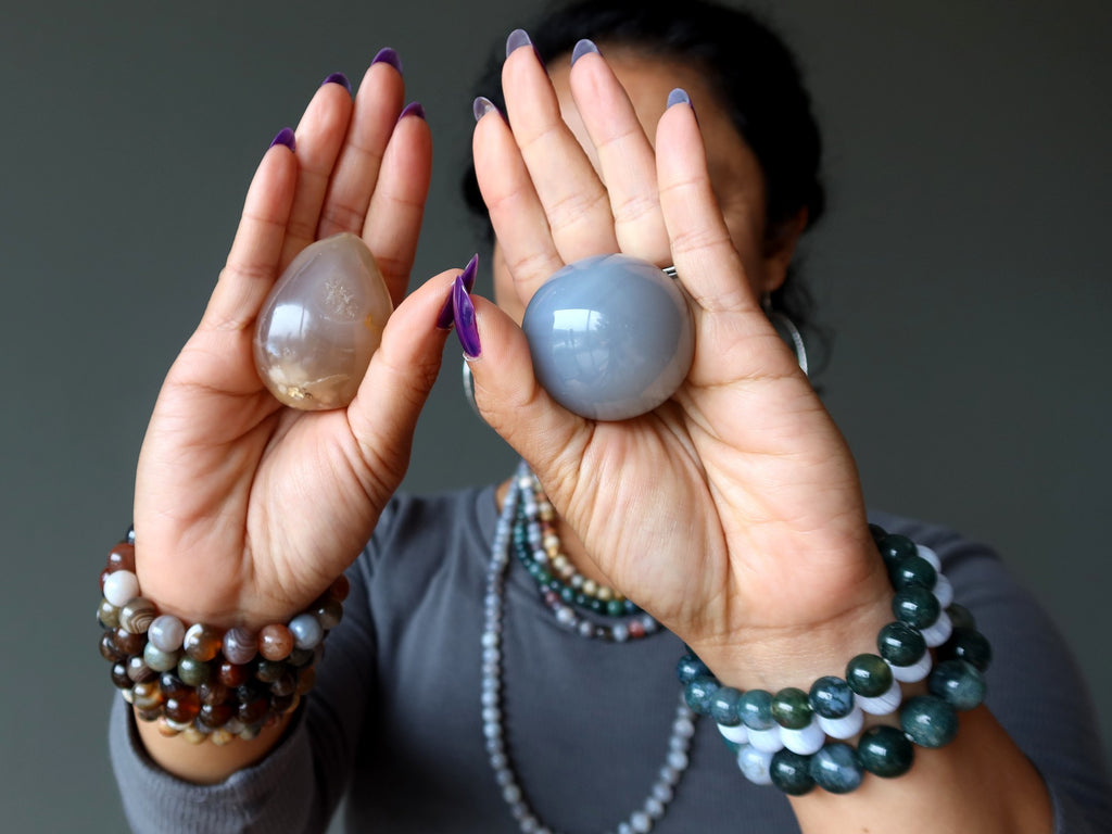 woman holding and wearing agate