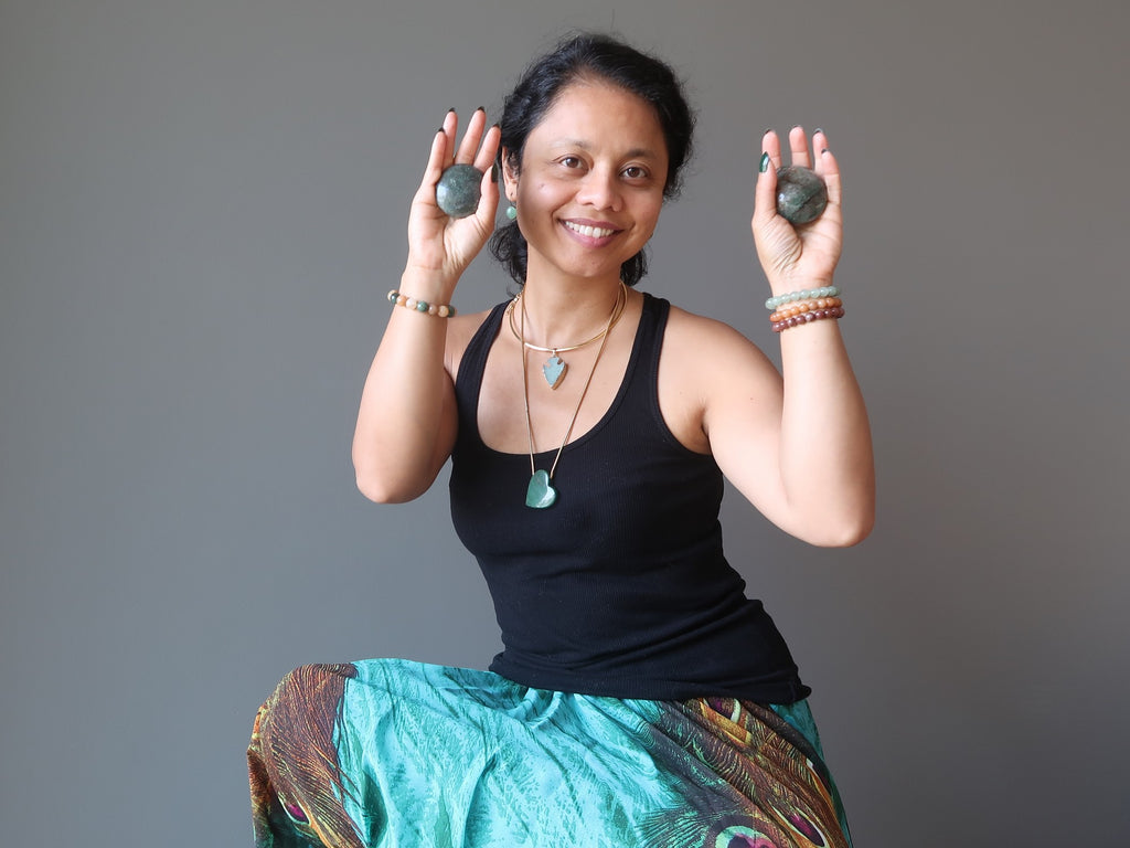 sheila of satin crystals holding grey aventurine stones in her hands