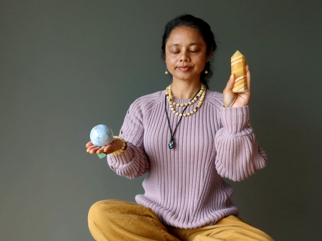 woman meditating with calcite