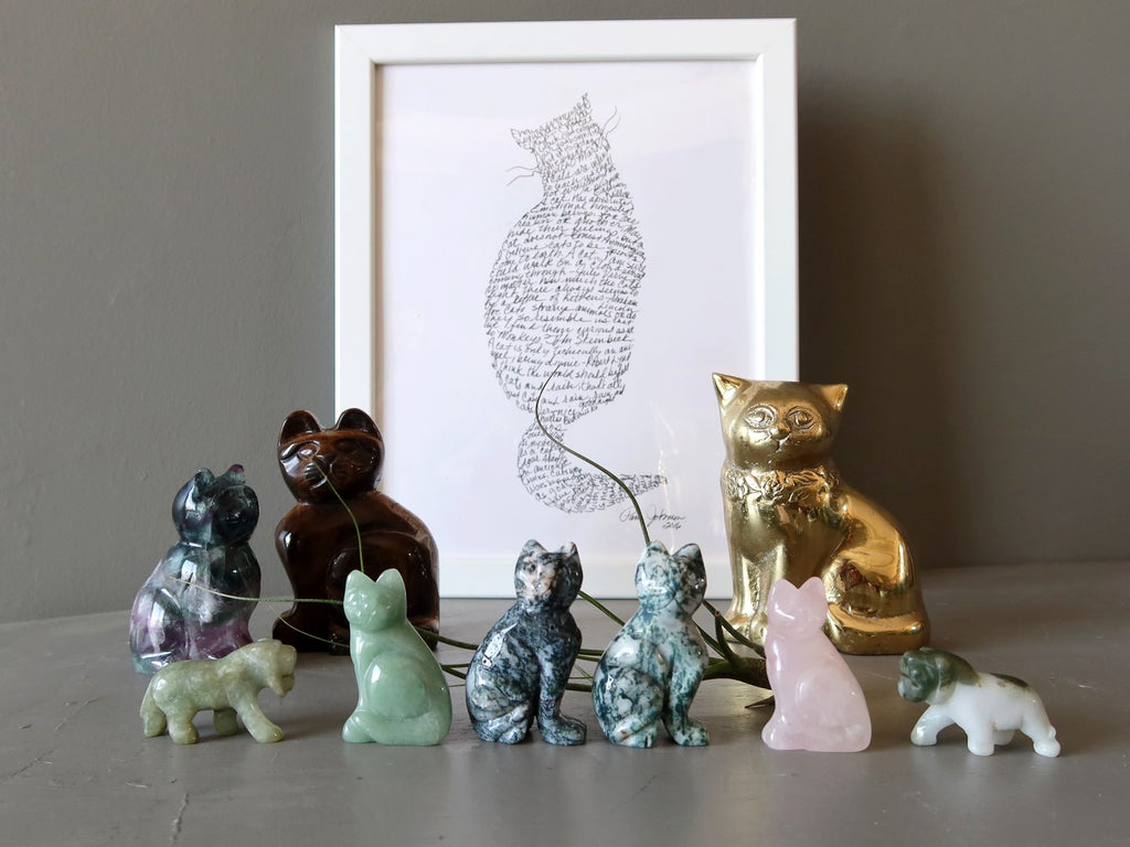 cat figurines and drawing