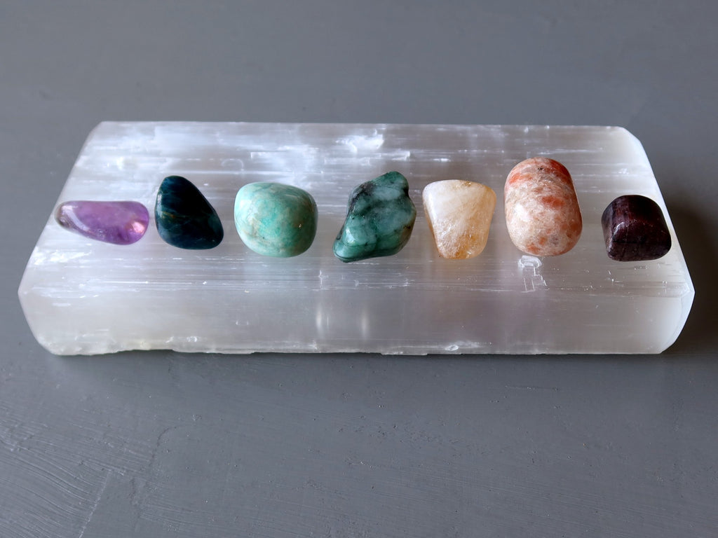 chakra stones on selenite slab