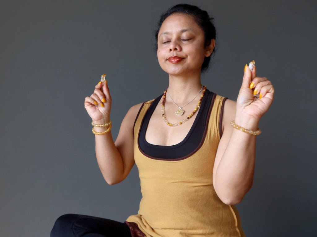 sheila of satin crystals meditating with citrine raw points