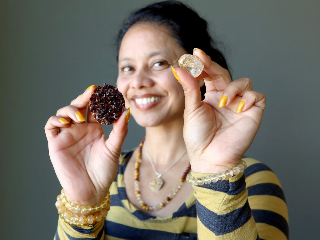 sheila of satin crystals holding citrine