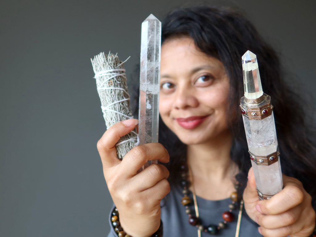 clearing the home with quartz wands and sage at satin crystals