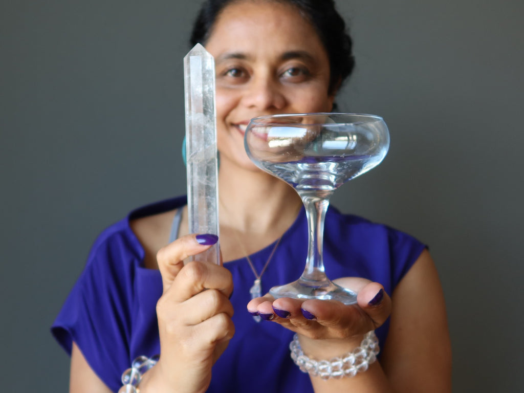 sheila of satin crystals holding real quartz wand and glass martini