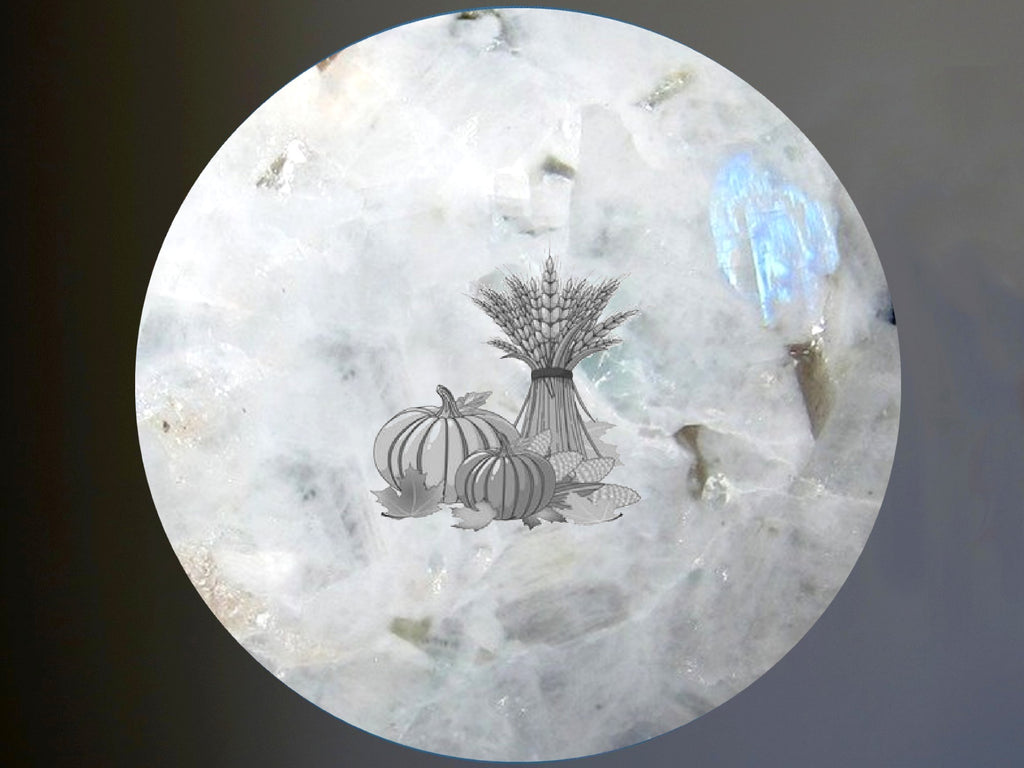 rainbow moonstone sphere representing the full moon