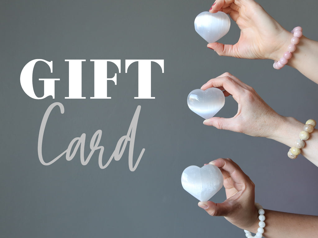 Gift Card with three hands holding three selenite hearts