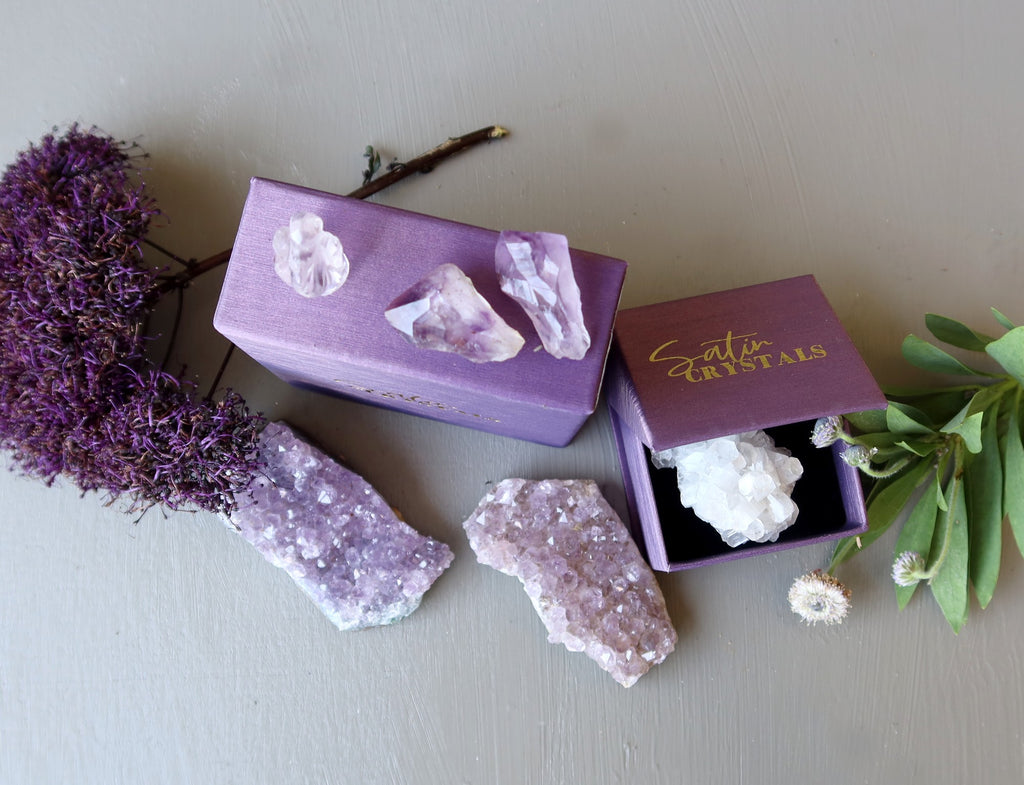 amethyst, calcite crystals, flowers and purple satin crystals gift boxes