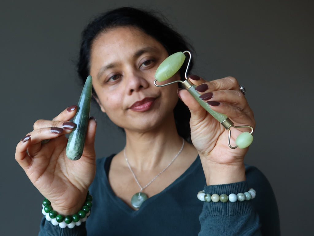 sheila of satin crystals holding jade and serpentine wands