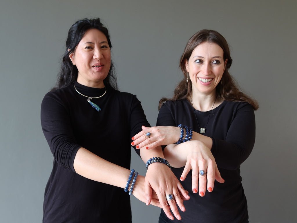 women wearing kyanite jewelry