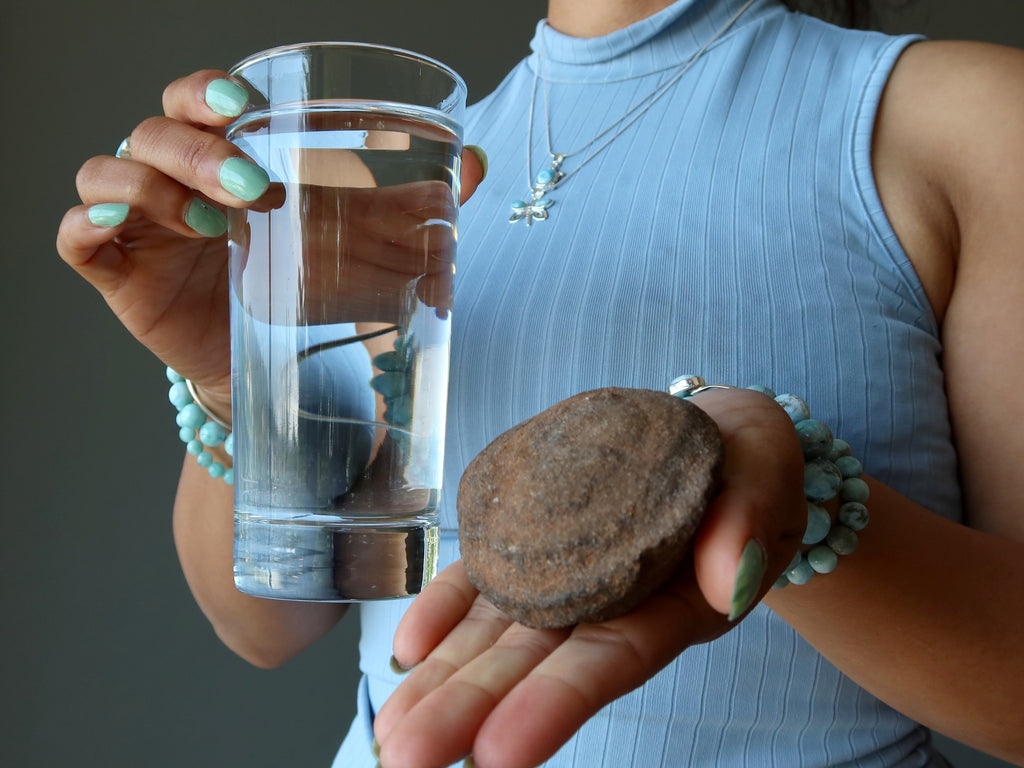 moqui marble and glass of water for grounding