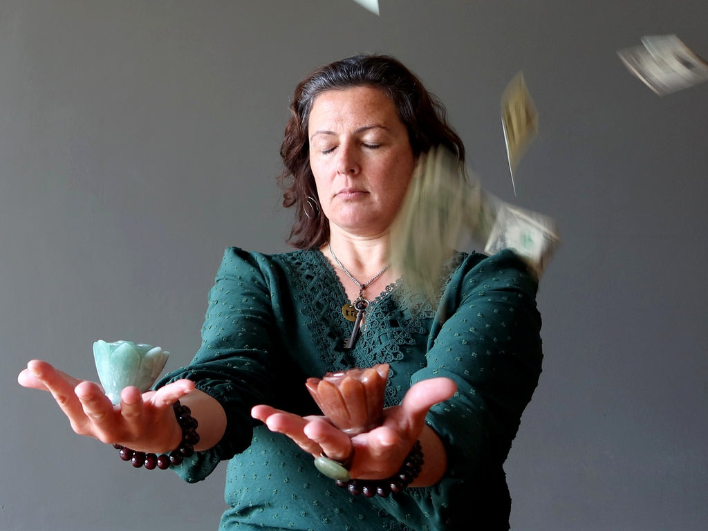 women meditating with aventurine lotus crystals