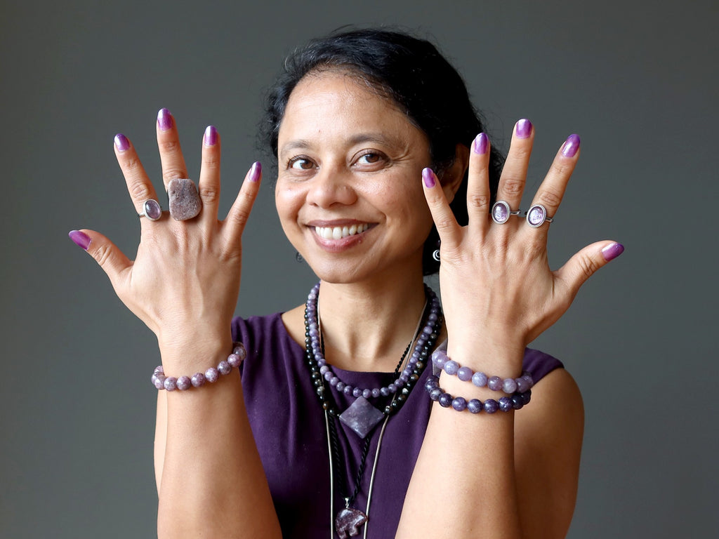 woman wearing lepidolite jewelry