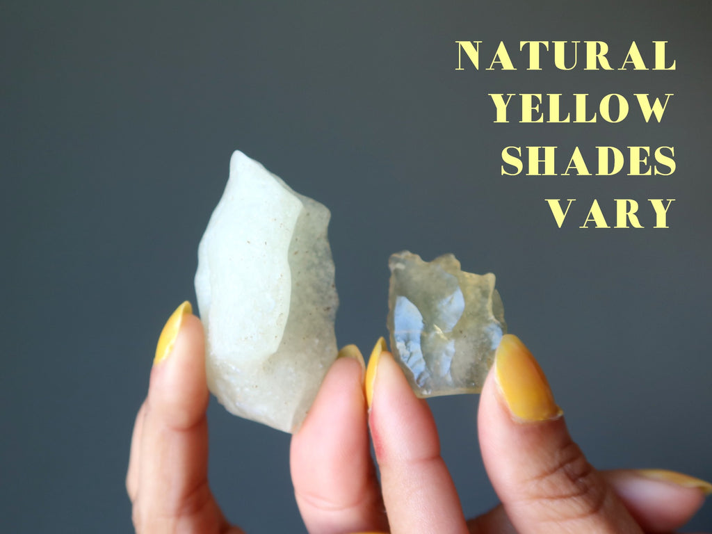 two pieces of libyan desert glass to show natural yellow shades vary