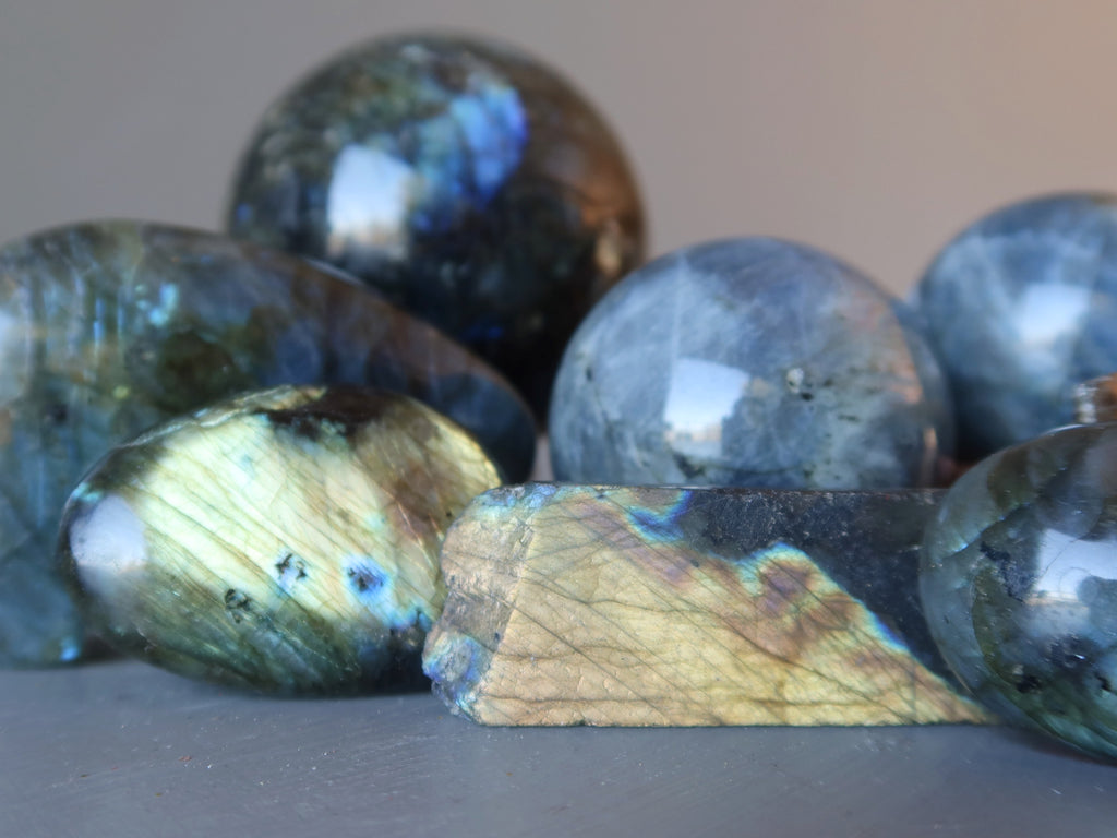 pile of labradorite stones and spheres