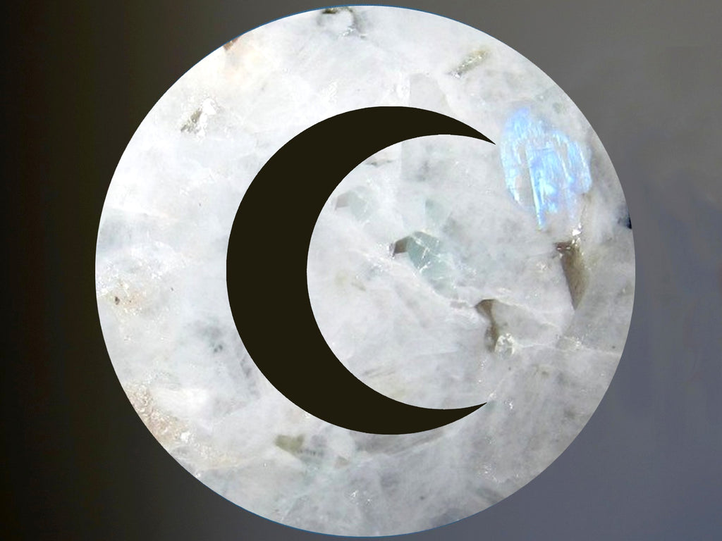 rainbow moonstone sphere with a new moon cutout