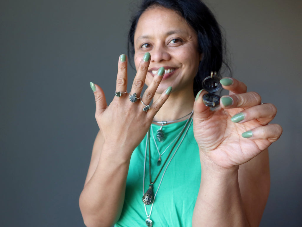 sheila of satin crystals wearing moldavite jewelry