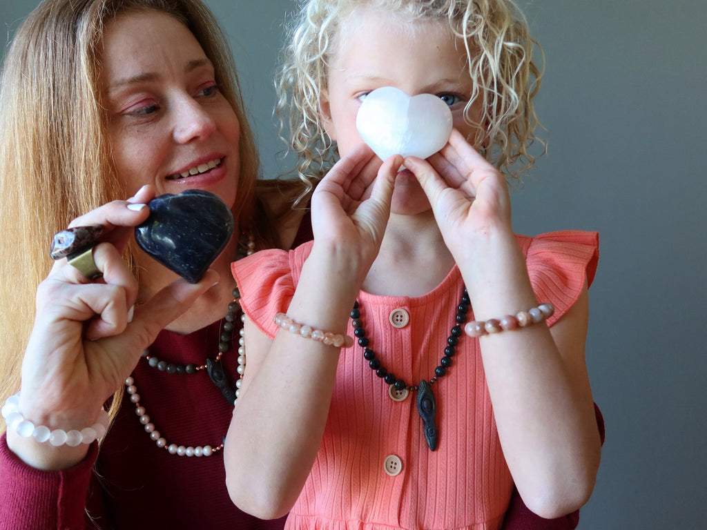 mother and daughter with crystal hearts