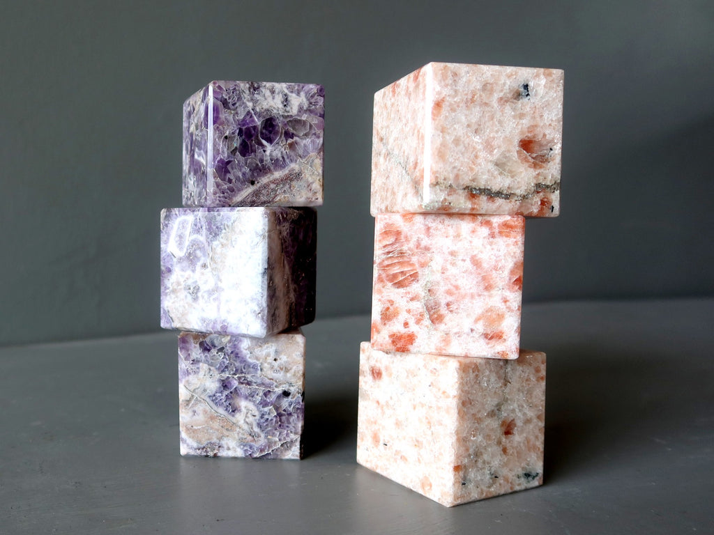 stacks of amethyst and sunstone cubes