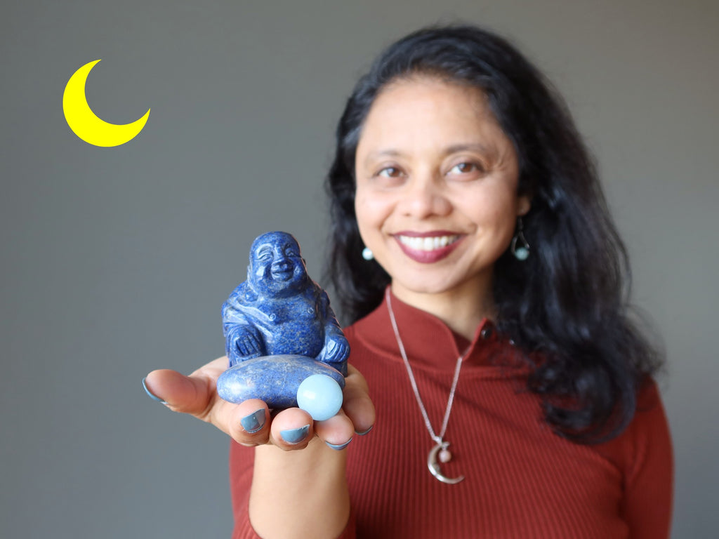 sheila of satin crystals holding lapis buddha, dumortierite heart, aquamarine sphere