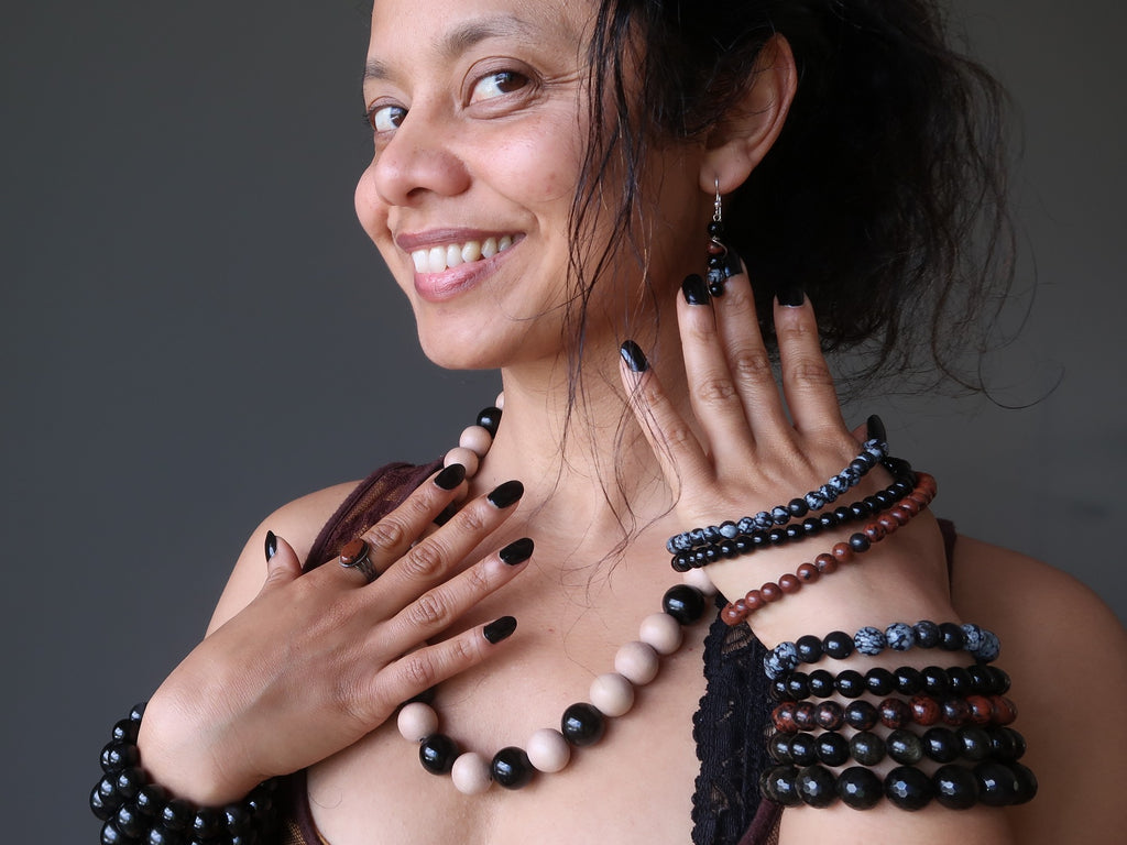 woman wearing obsidian jewelry