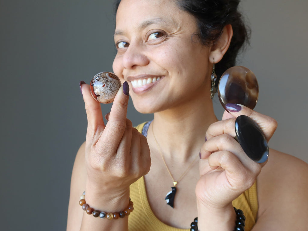 sheila of satin crystals holding sardonyx crystals